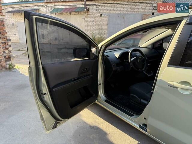 Сірий Мазда 5, об'ємом двигуна 2 л та пробігом 237 тис. км за 5400 $, фото 4 на Automoto.ua