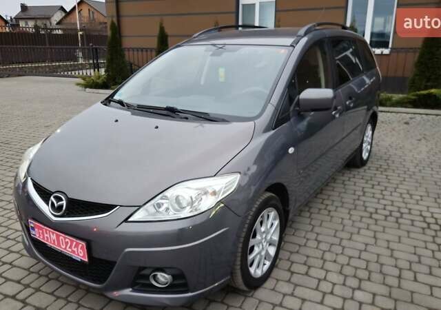 Серый Мазда 5, объемом двигателя 2 л и пробегом 193 тыс. км за 6950 $, фото 4 на Automoto.ua