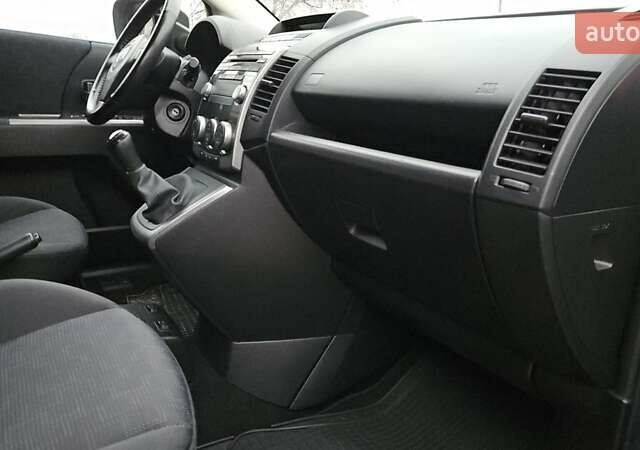 Серый Мазда 5, объемом двигателя 2 л и пробегом 193 тыс. км за 6950 $, фото 72 на Automoto.ua