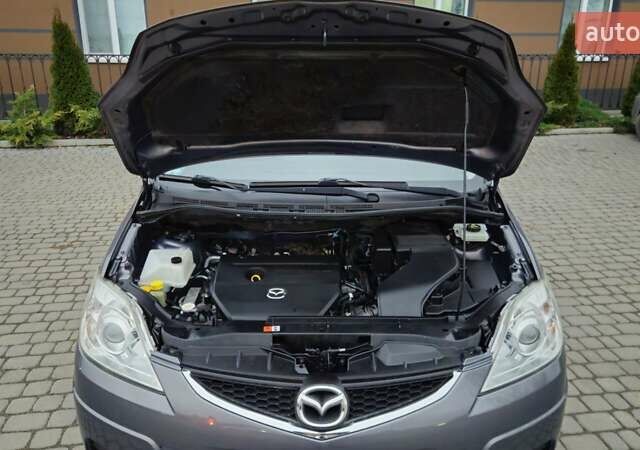 Серый Мазда 5, объемом двигателя 2 л и пробегом 193 тыс. км за 6950 $, фото 48 на Automoto.ua