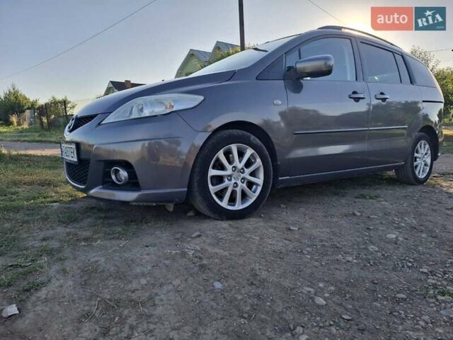 Серый Мазда 5, объемом двигателя 2 л и пробегом 247 тыс. км за 7200 $, фото 2 на Automoto.ua