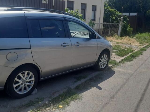 Серый Мазда 5, объемом двигателя 2 л и пробегом 217 тыс. км за 5700 $, фото 1 на Automoto.ua