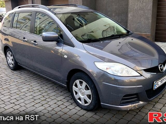 Серый Мазда 5, объемом двигателя 2 л и пробегом 250 тыс. км за 7500 $, фото 1 на Automoto.ua