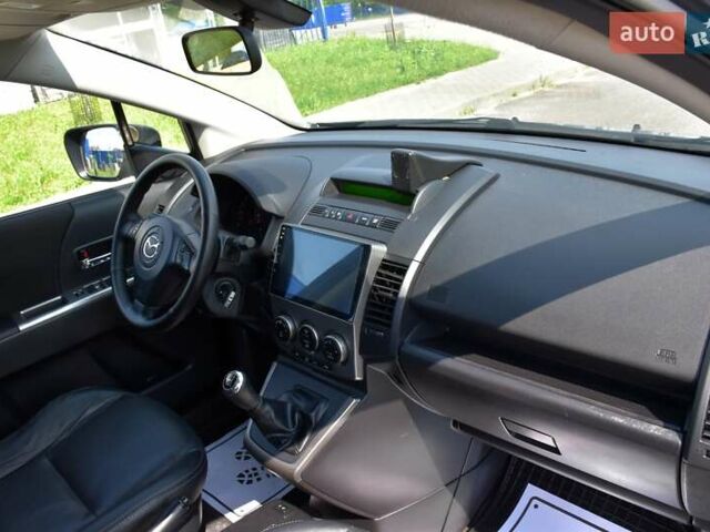 Серый Мазда 5, объемом двигателя 2 л и пробегом 235 тыс. км за 7200 $, фото 33 на Automoto.ua