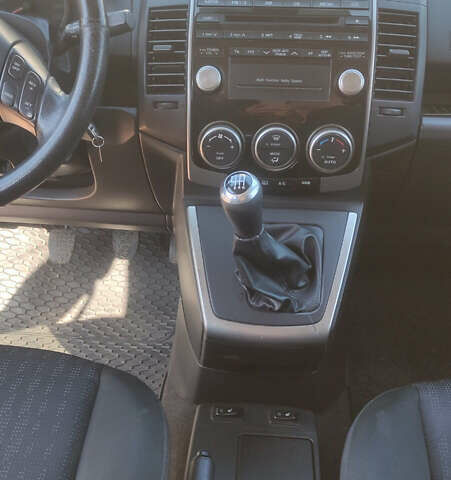 Серый Мазда 5, объемом двигателя 2 л и пробегом 282 тыс. км за 6100 $, фото 16 на Automoto.ua