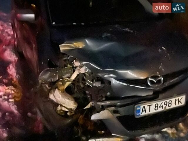 Сірий Мазда 5, об'ємом двигуна 2 л та пробігом 250 тис. км за 1600 $, фото 4 на Automoto.ua