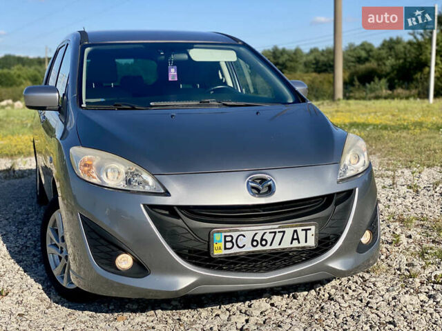 Серый Мазда 5, объемом двигателя 2 л и пробегом 150 тыс. км за 7599 $, фото 5 на Automoto.ua