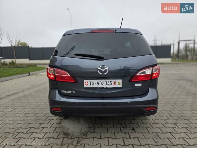 Серый Мазда 5, объемом двигателя 2 л и пробегом 280 тыс. км за 6650 $, фото 15 на Automoto.ua