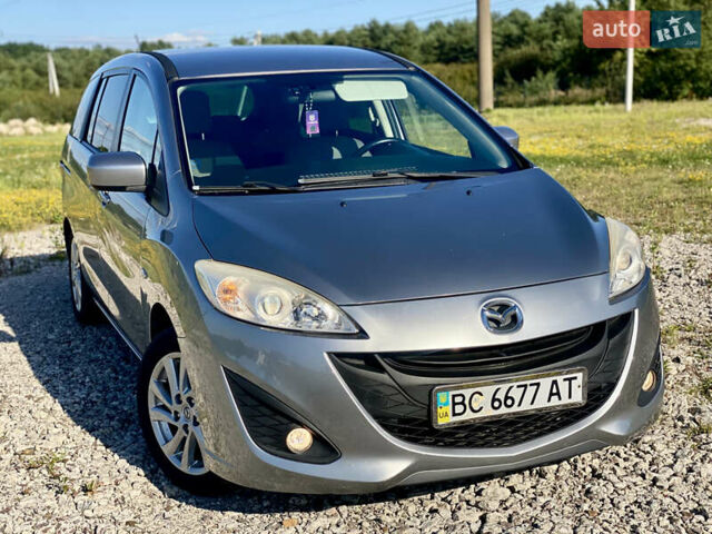 Серый Мазда 5, объемом двигателя 2 л и пробегом 150 тыс. км за 7599 $, фото 4 на Automoto.ua