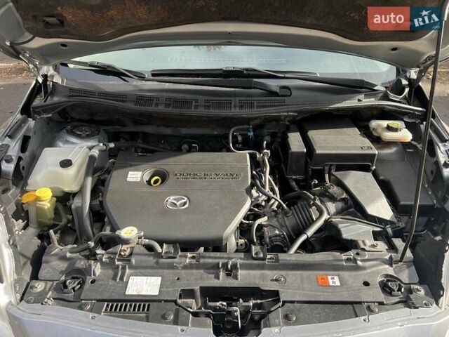 Серый Мазда 5, объемом двигателя 2.5 л и пробегом 170 тыс. км за 7800 $, фото 38 на Automoto.ua