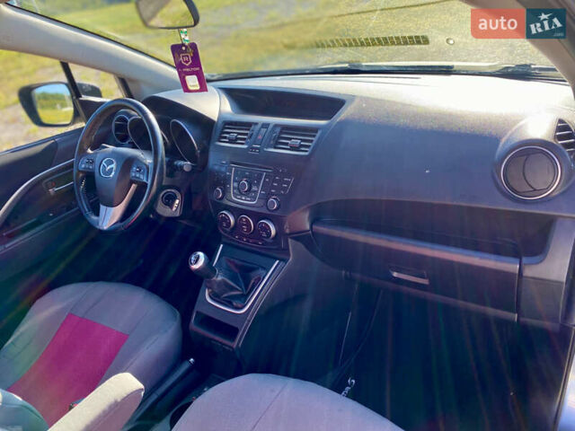 Серый Мазда 5, объемом двигателя 2 л и пробегом 150 тыс. км за 7599 $, фото 18 на Automoto.ua