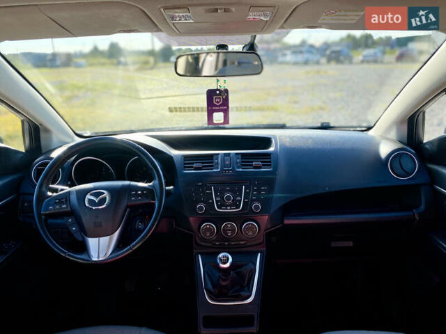 Серый Мазда 5, объемом двигателя 2 л и пробегом 150 тыс. км за 7599 $, фото 30 на Automoto.ua
