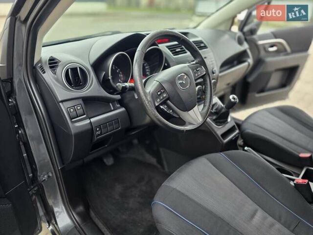 Серый Мазда 5, объемом двигателя 2 л и пробегом 280 тыс. км за 6650 $, фото 33 на Automoto.ua