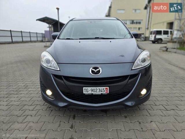 Серый Мазда 5, объемом двигателя 2 л и пробегом 280 тыс. км за 6650 $, фото 3 на Automoto.ua