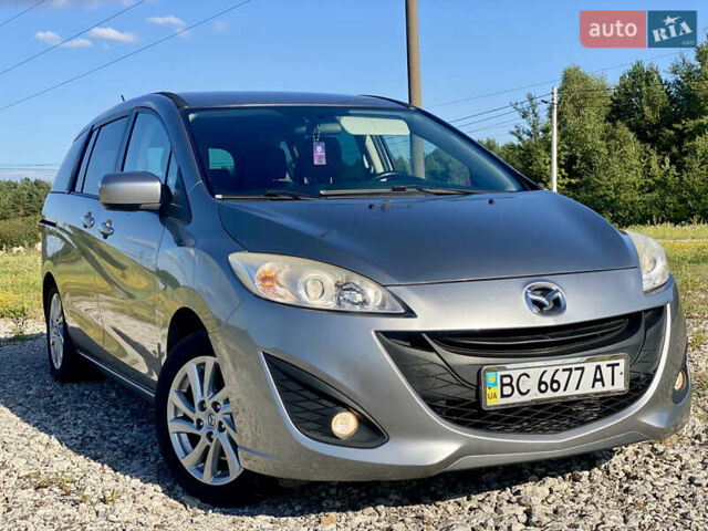 Серый Мазда 5, объемом двигателя 2 л и пробегом 150 тыс. км за 7599 $, фото 3 на Automoto.ua