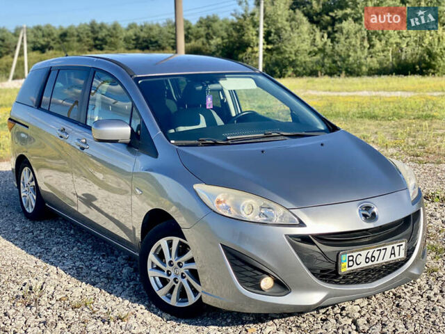 Серый Мазда 5, объемом двигателя 2 л и пробегом 150 тыс. км за 7599 $, фото 2 на Automoto.ua