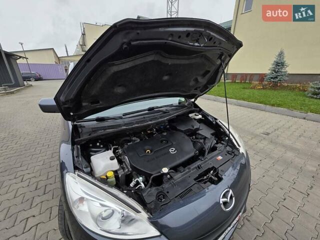 Серый Мазда 5, объемом двигателя 2 л и пробегом 280 тыс. км за 6650 $, фото 53 на Automoto.ua