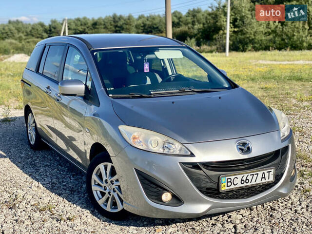 Серый Мазда 5, объемом двигателя 2 л и пробегом 150 тыс. км за 7599 $, фото 6 на Automoto.ua
