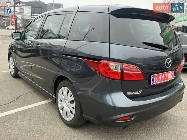Серый Мазда 5, объемом двигателя 2 л и пробегом 258 тыс. км за 11000 $, фото 2 на Automoto.ua
