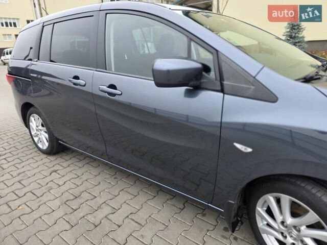 Серый Мазда 5, объемом двигателя 2 л и пробегом 280 тыс. км за 6650 $, фото 4 на Automoto.ua