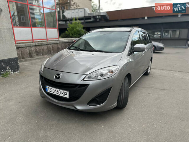 Серый Мазда 5, объемом двигателя 2.49 л и пробегом 257 тыс. км за 8300 $, фото 1 на Automoto.ua
