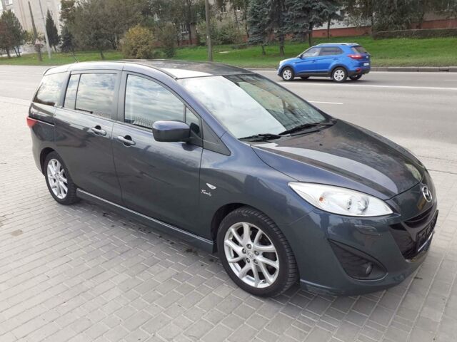 Серый Мазда 5, объемом двигателя 2 л и пробегом 201 тыс. км за 8490 $, фото 1 на Automoto.ua