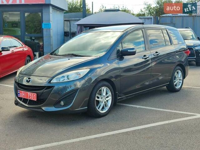 Серый Мазда 5, объемом двигателя 2 л и пробегом 196 тыс. км за 11000 $, фото 1 на Automoto.ua