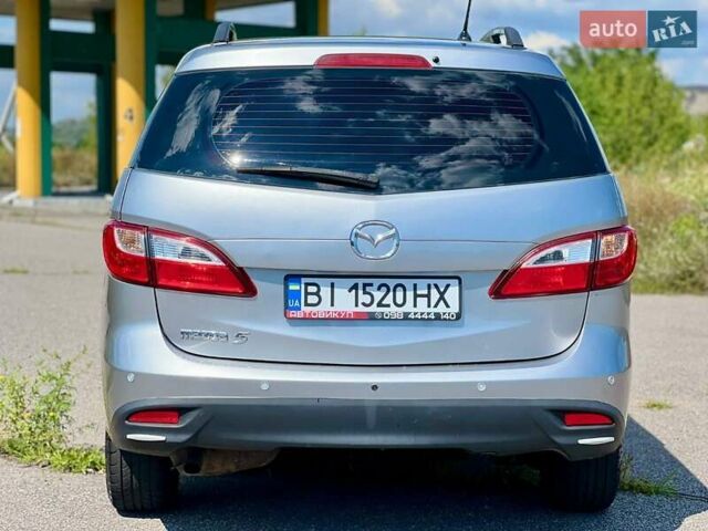 Серый Мазда 5, объемом двигателя 2.5 л и пробегом 350 тыс. км за 7000 $, фото 1 на Automoto.ua