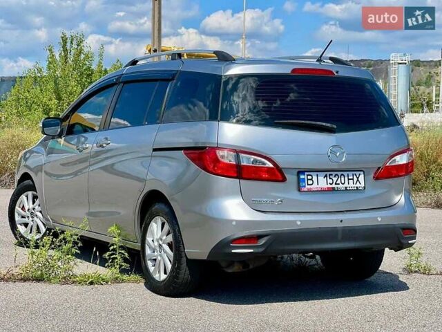 Серый Мазда 5, объемом двигателя 2.5 л и пробегом 350 тыс. км за 7000 $, фото 2 на Automoto.ua