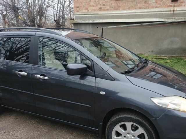 Серый Мазда 5, объемом двигателя 1.8 л и пробегом 258 тыс. км за 4500 $, фото 1 на Automoto.ua