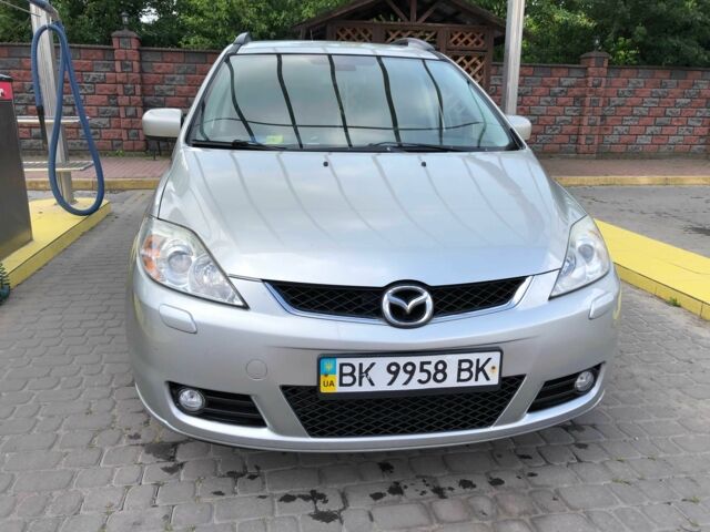 Серый Мазда 5, объемом двигателя 2 л и пробегом 257 тыс. км за 6500 $, фото 1 на Automoto.ua