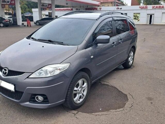 Серый Мазда 5, объемом двигателя 2 л и пробегом 300 тыс. км за 5499 $, фото 1 на Automoto.ua