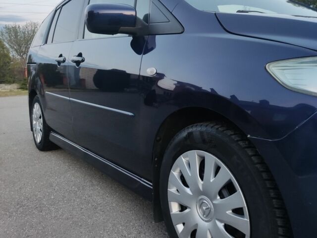 Синий Мазда 5, объемом двигателя 2 л и пробегом 257 тыс. км за 5250 $, фото 2 на Automoto.ua