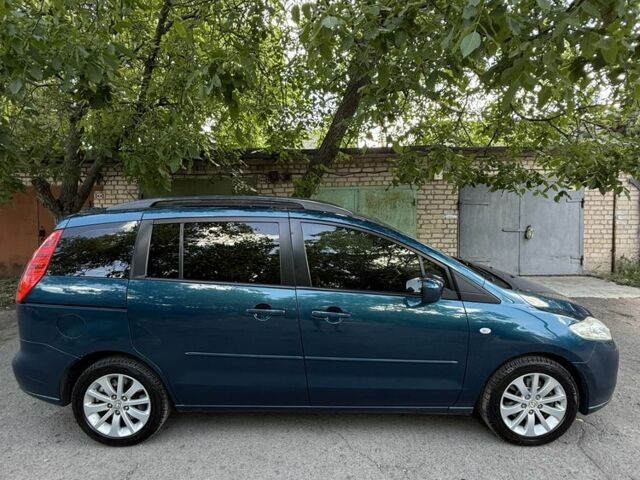 Синий Мазда 5, объемом двигателя 1.8 л и пробегом 242 тыс. км за 3896 $, фото 4 на Automoto.ua