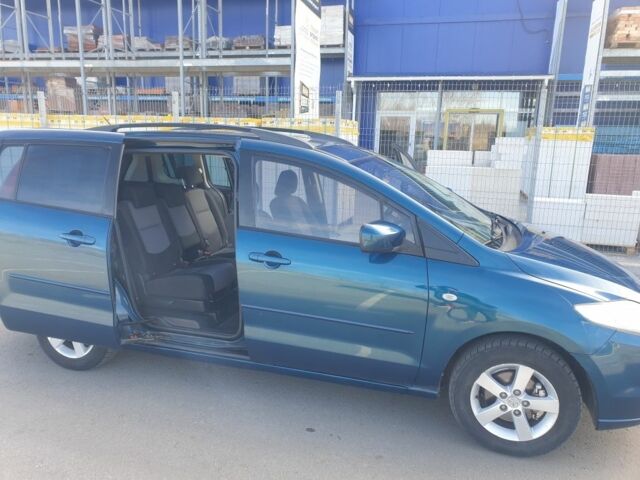 Синий Мазда 5, объемом двигателя 1.8 л и пробегом 208 тыс. км за 4200 $, фото 1 на Automoto.ua