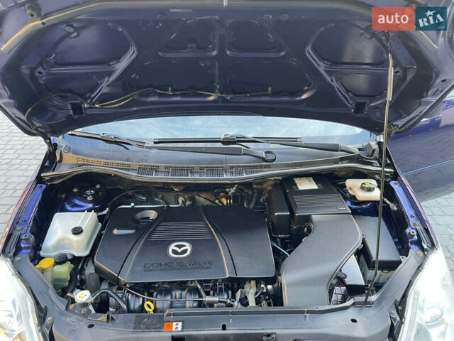 Синій Мазда 5, об'ємом двигуна 2 л та пробігом 258 тис. км за 4200 $, фото 38 на Automoto.ua