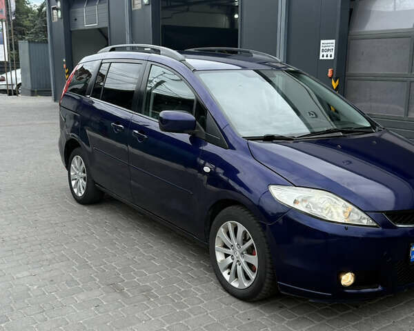Синий Мазда 5, объемом двигателя 2 л и пробегом 214 тыс. км за 4750 $, фото 4 на Automoto.ua