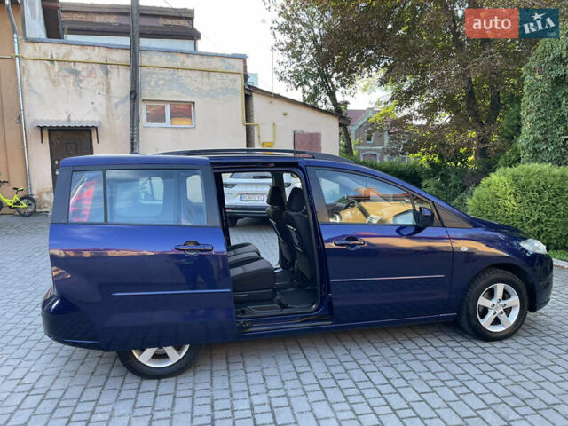 Синій Мазда 5, об'ємом двигуна 2 л та пробігом 258 тис. км за 4200 $, фото 18 на Automoto.ua