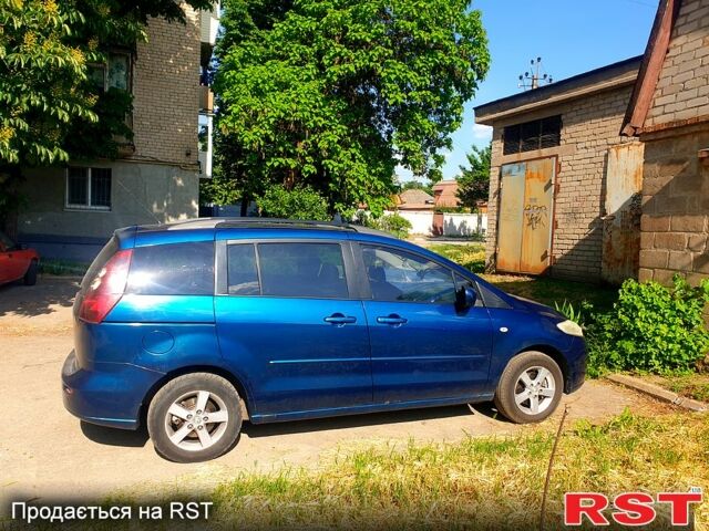 Синий Мазда 5, объемом двигателя 1.8 л и пробегом 217 тыс. км за 4300 $, фото 1 на Automoto.ua
