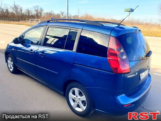 Синий Мазда 5, объемом двигателя 1.8 л и пробегом 195 тыс. км за 4500 $, фото 5 на Automoto.ua