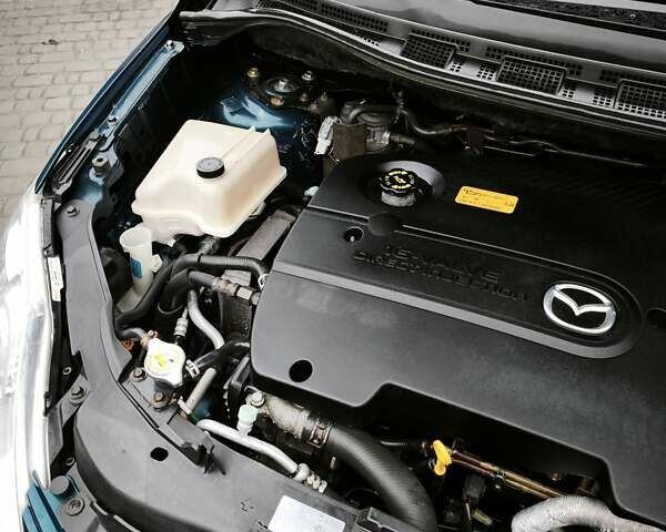 Синий Мазда 5, объемом двигателя 2 л и пробегом 187 тыс. км за 4999 $, фото 6 на Automoto.ua