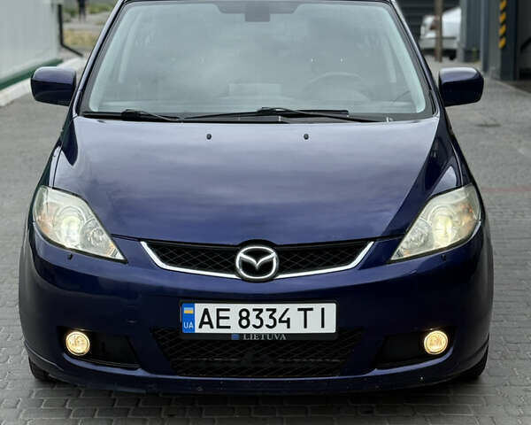 Синий Мазда 5, объемом двигателя 2 л и пробегом 214 тыс. км за 4750 $, фото 2 на Automoto.ua