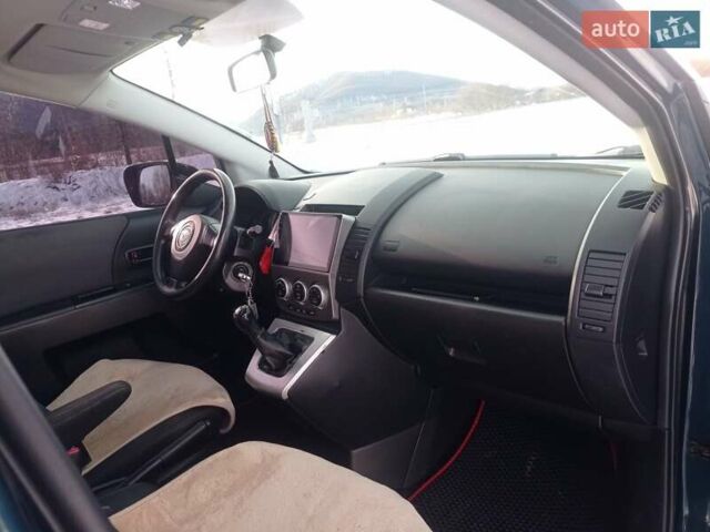 Синий Мазда 5, объемом двигателя 1.8 л и пробегом 235 тыс. км за 5000 $, фото 16 на Automoto.ua