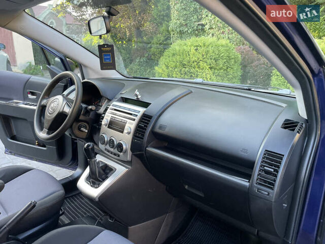 Синій Мазда 5, об'ємом двигуна 2 л та пробігом 258 тис. км за 4200 $, фото 33 на Automoto.ua