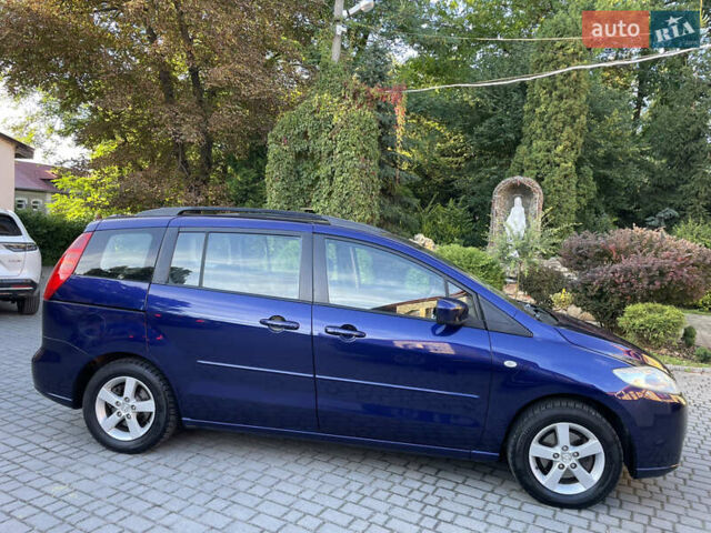 Синій Мазда 5, об'ємом двигуна 2 л та пробігом 258 тис. км за 4200 $, фото 5 на Automoto.ua
