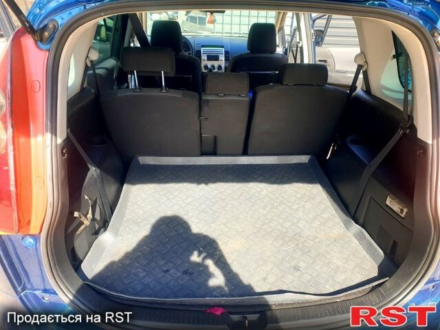 Синий Мазда 5, объемом двигателя 1.8 л и пробегом 195 тыс. км за 4500 $, фото 11 на Automoto.ua
