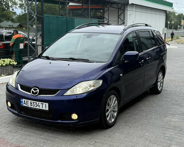 Синий Мазда 5, объемом двигателя 2 л и пробегом 214 тыс. км за 4750 $, фото 3 на Automoto.ua