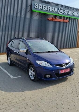 Синий Мазда 5, объемом двигателя 2 л и пробегом 238 тыс. км за 4400 $, фото 1 на Automoto.ua