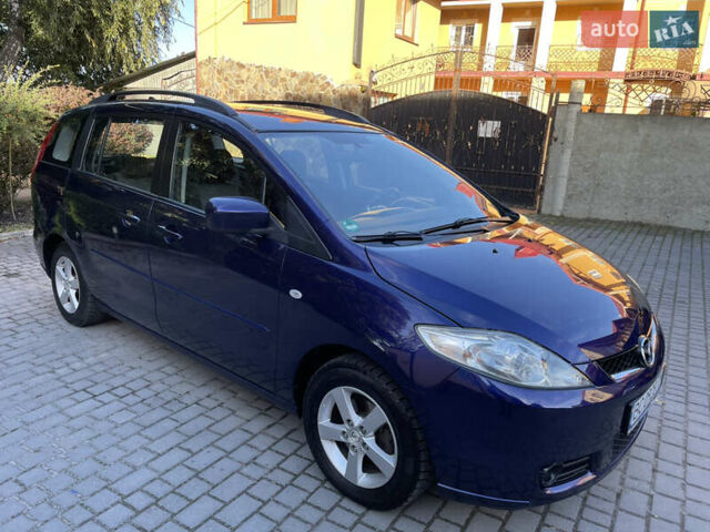 Синій Мазда 5, об'ємом двигуна 2 л та пробігом 258 тис. км за 4200 $, фото 1 на Automoto.ua