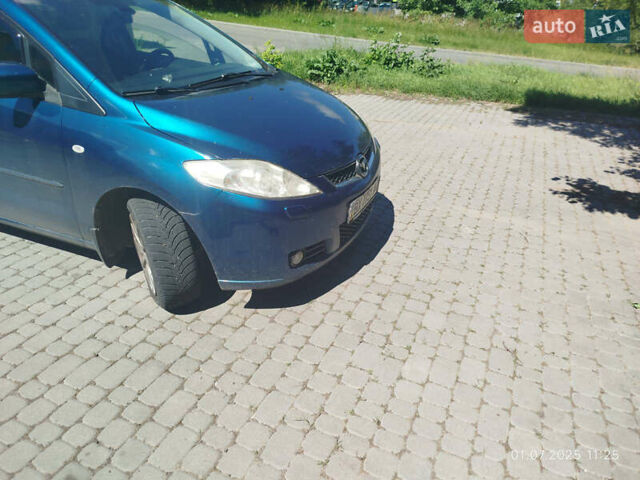 Синий Мазда 5, объемом двигателя 2 л и пробегом 260 тыс. км за 5000 $, фото 5 на Automoto.ua